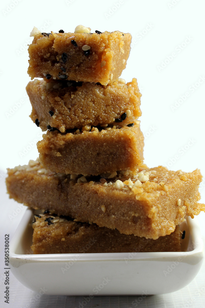 Sukhadi or Gor Papdi is Indian Traditional sweet made with wheat flour