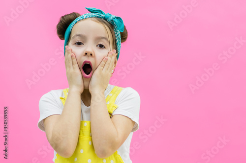 Little girl looks suprised. Little girl looks suprised