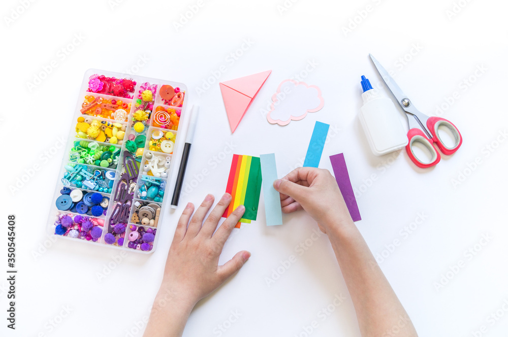 Bookmark for a child book to school. Bright rainbow from the cloud Bookmark for a child book to school. Bright rainbow from the cloud