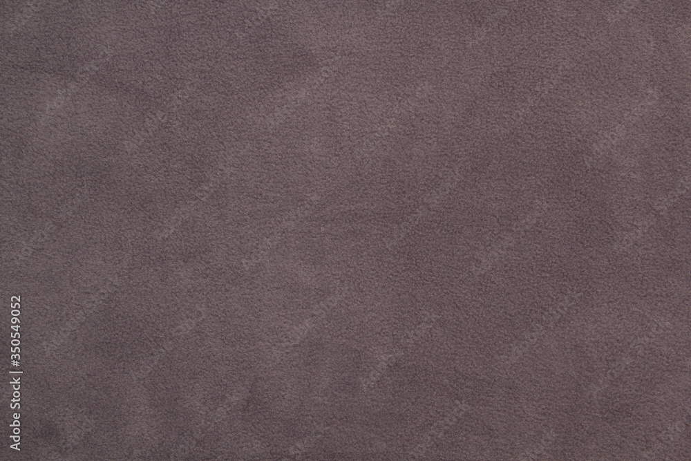 Fleece fabric gray top view. Texture of textile fleece bedspread. Fleece fabric gray top view. Texture of textile fleece bedspread.