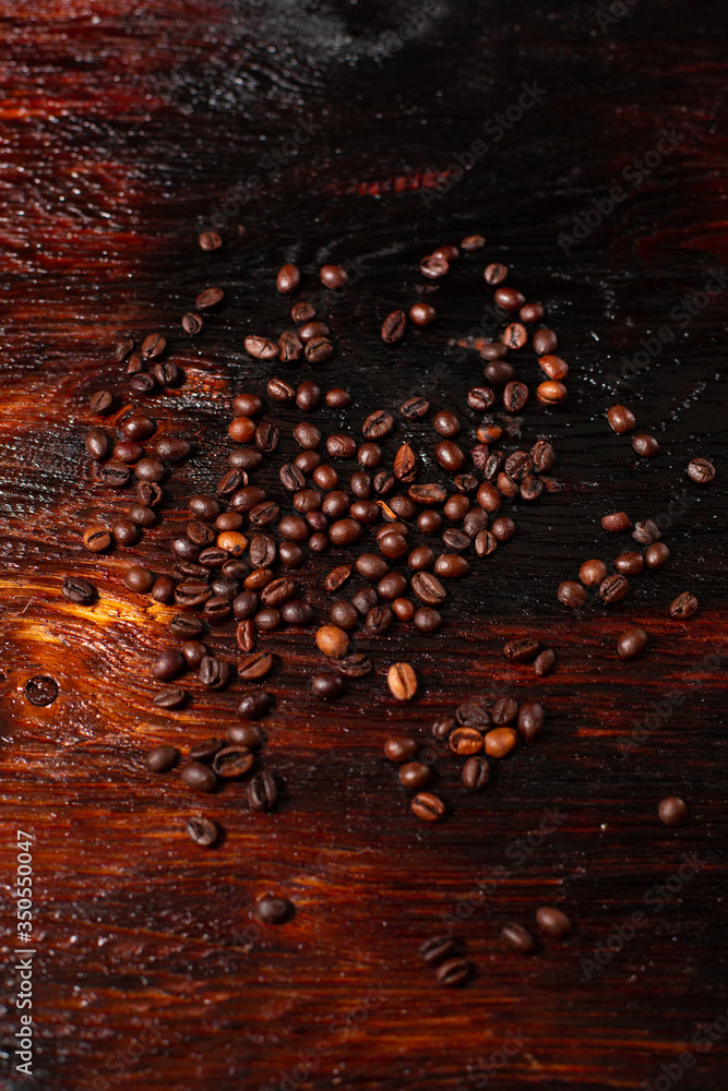 Coffee beans on the wooden table