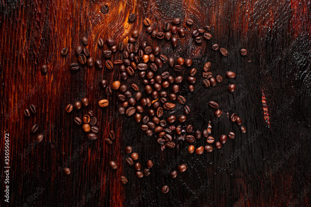 Coffee beans on the wooden table