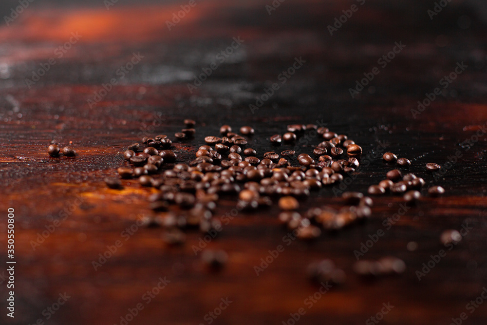 Coffee beans on the wooden table