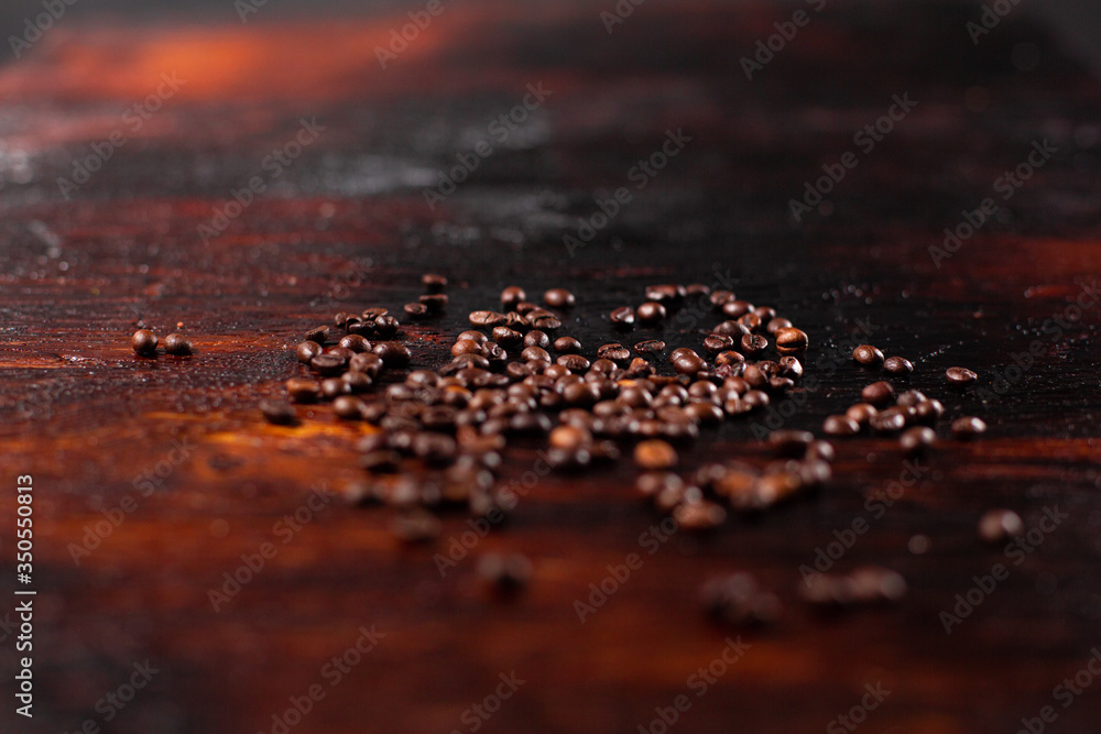 Coffee beans on the wooden table