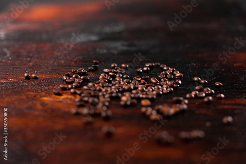 Coffee beans on the wooden table