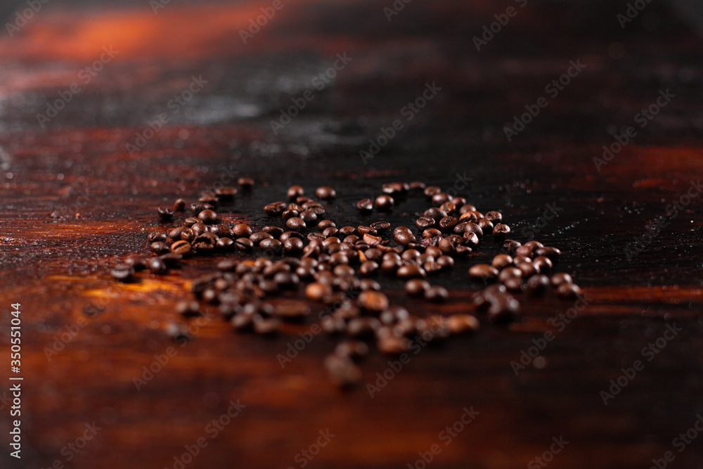 Coffee beans on the wooden table