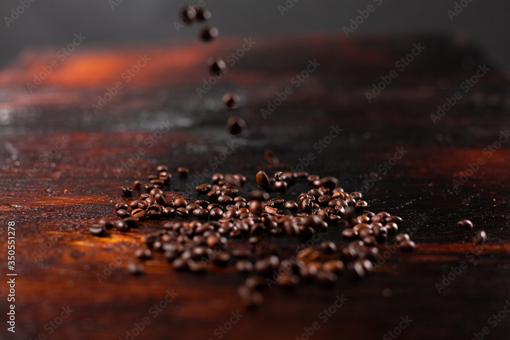 Coffee beans on the wooden table