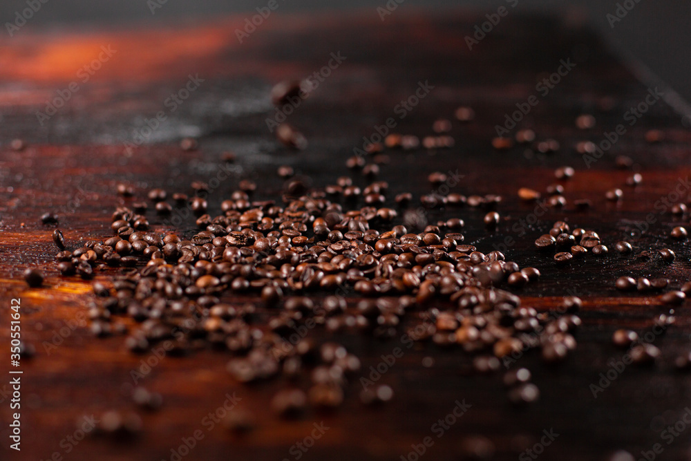 Coffee beans on the wooden table
