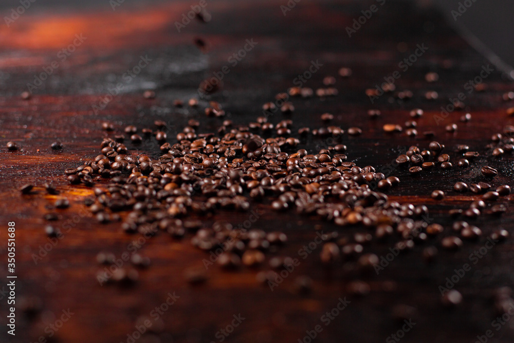 Coffee beans on the wooden table