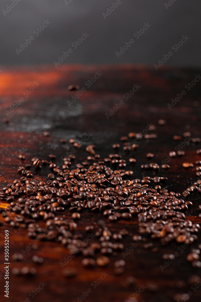Coffee beans on the wooden table