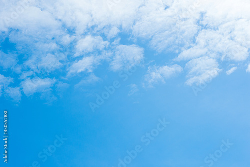 white cirrocumulus clouds on blue sky photo