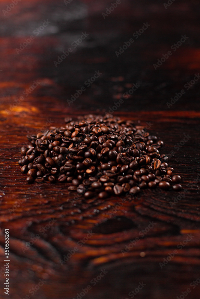 Coffee beans on the wooden table