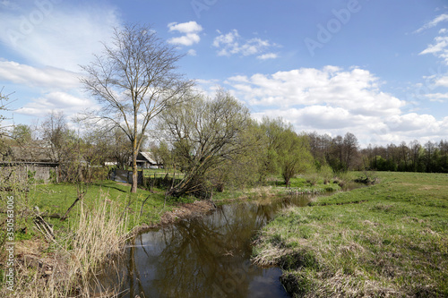 View of the Isloch River near the town of Rakov in Belarus. photo