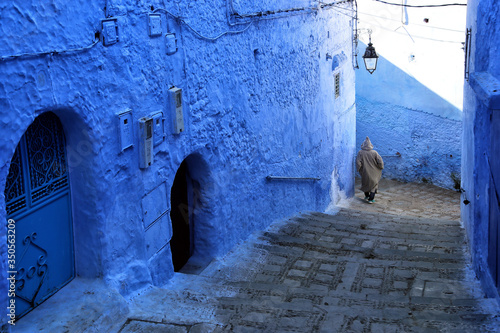 Chefchaouen, Morocco - 02.24.2019: View from the city street where all buildings are painted only in blue.