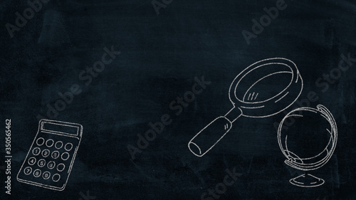 a blackboard with a world map with a magnifying glass and a calculator