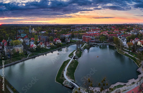 Bild auf Leinwand sunset at lake Poplavok, kaliningrad