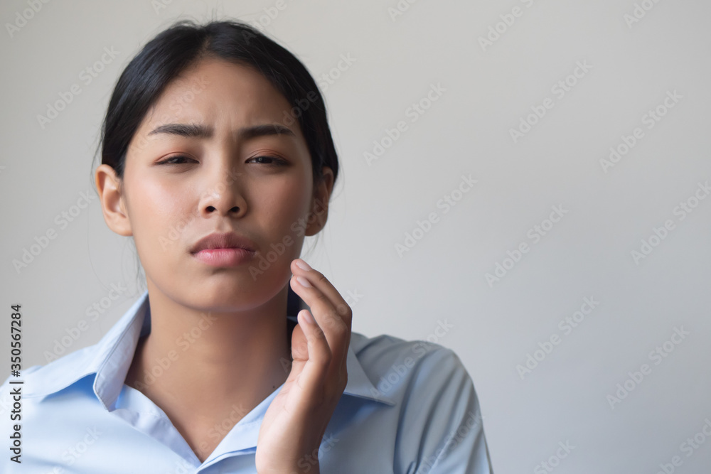 woman with toothache; sick asian woman suffering from toothache, tooth decay, tooth sensitivity, wisdom tooth pain, cavity, dental care concept; young adult southeast asian woman model woman with toothache; sick asian woman suffering from toothache, tooth decay, tooth sensitivity, wisdom tooth pain, cavity, dental care concept; young adult southeast asian woman model