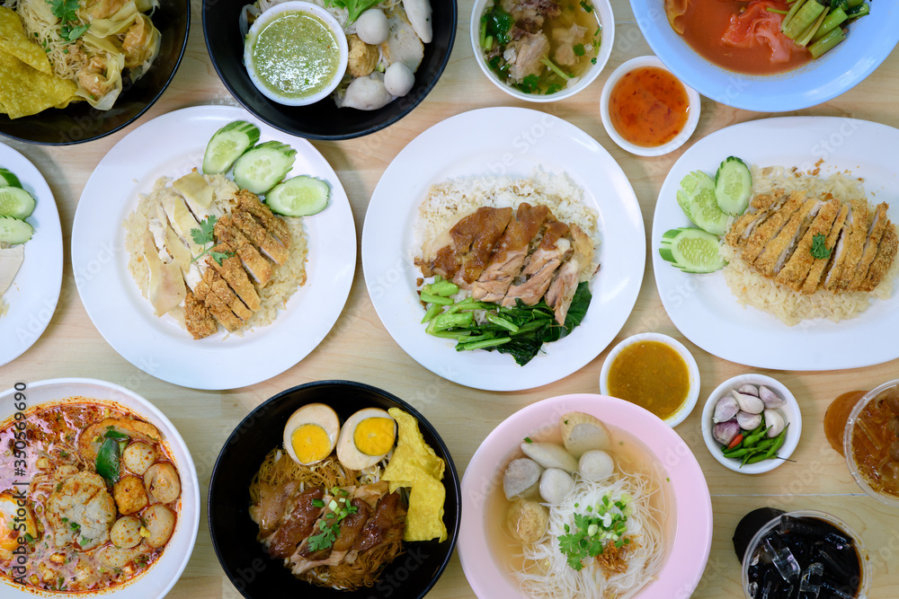 Top view composition with Thai Food. Chicken rice, Stewed pork leg on rice and noodle