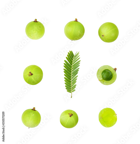 Indian gooseberry with leaf and juice on white background