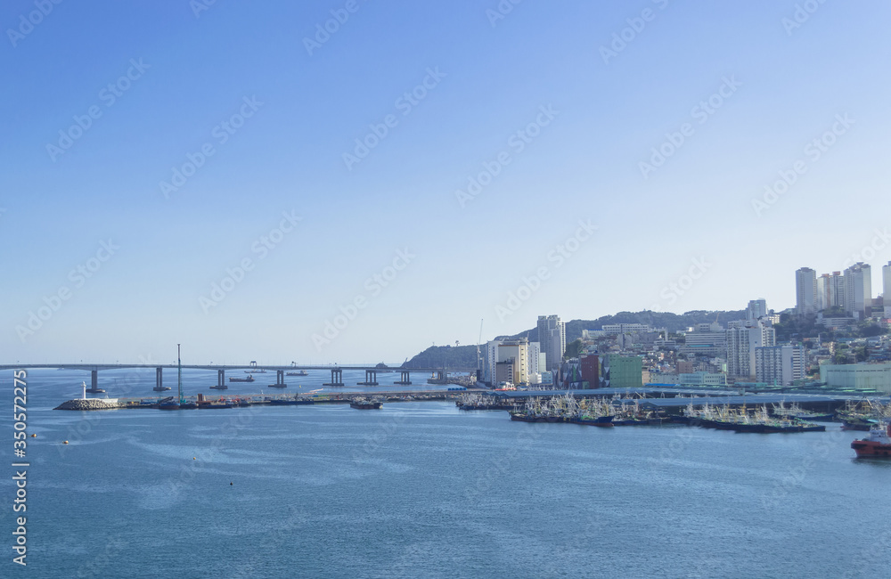 part of Busan with sea and bridge