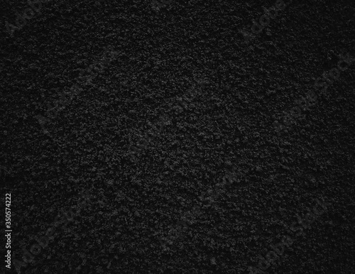 Black rough decorative plaster texture background