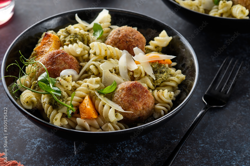 Pasta with meatballs and homemade parsley pesto sauce. Copy space. Pasta with meatballs and homemade parsley pesto sauce. Copy space.