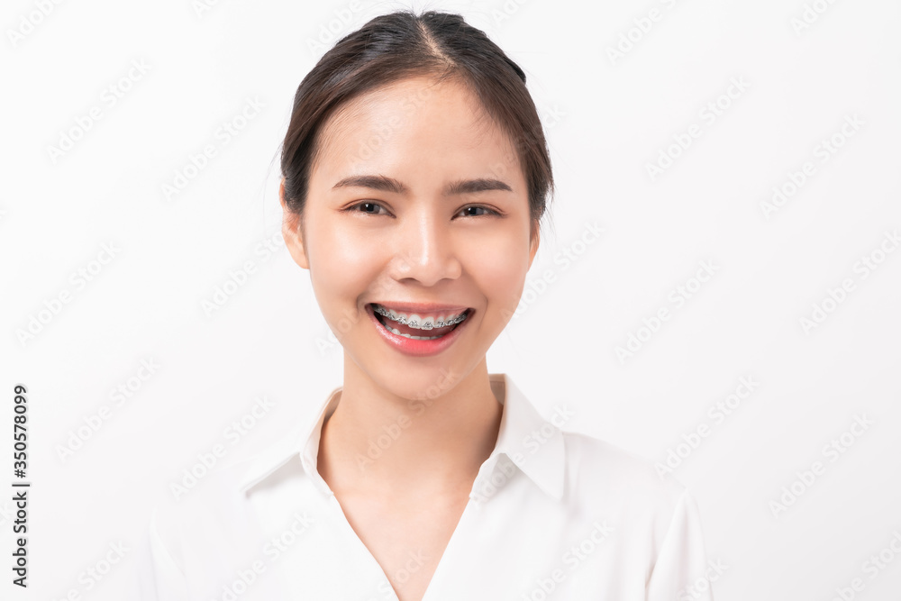 Cheerful beautiful Asian woman stand and smile on white background. Cheerful beautiful Asian woman stand and smile on white background.