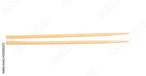 Light chopsticks isolated on white background