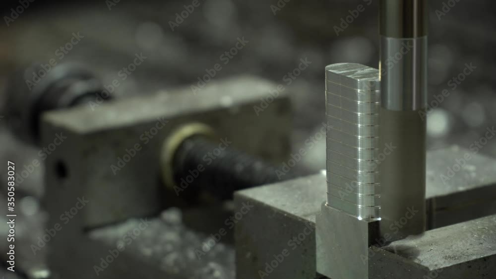 CNC milling machine produces detail from aluminum CNC milling machine produces detail from aluminum