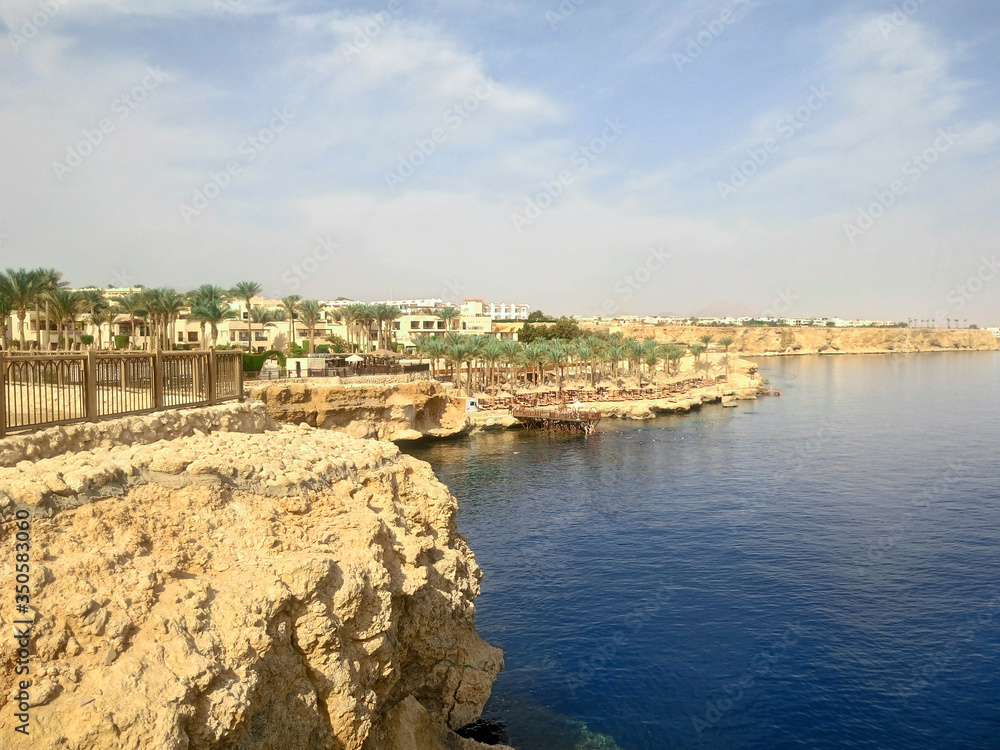 View of the Red Sea and the beach. Sharm el Sheikh at the southern tip of the Sinai Peninsula on the Red Sea coast of the Egyptian Riviera.
