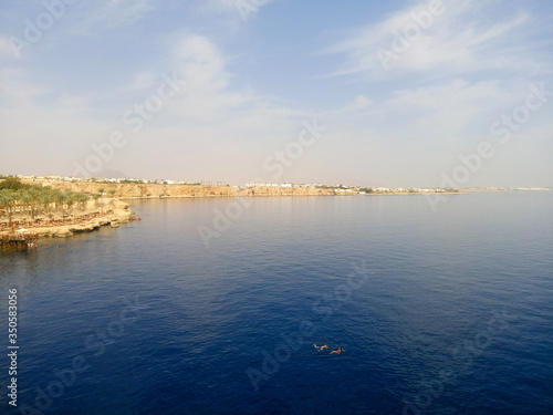 View of the Red Sea and the beach. Sharm el Sheikh at the southern tip of the Sinai Peninsula on the Red Sea coast of the Egyptian Riviera.