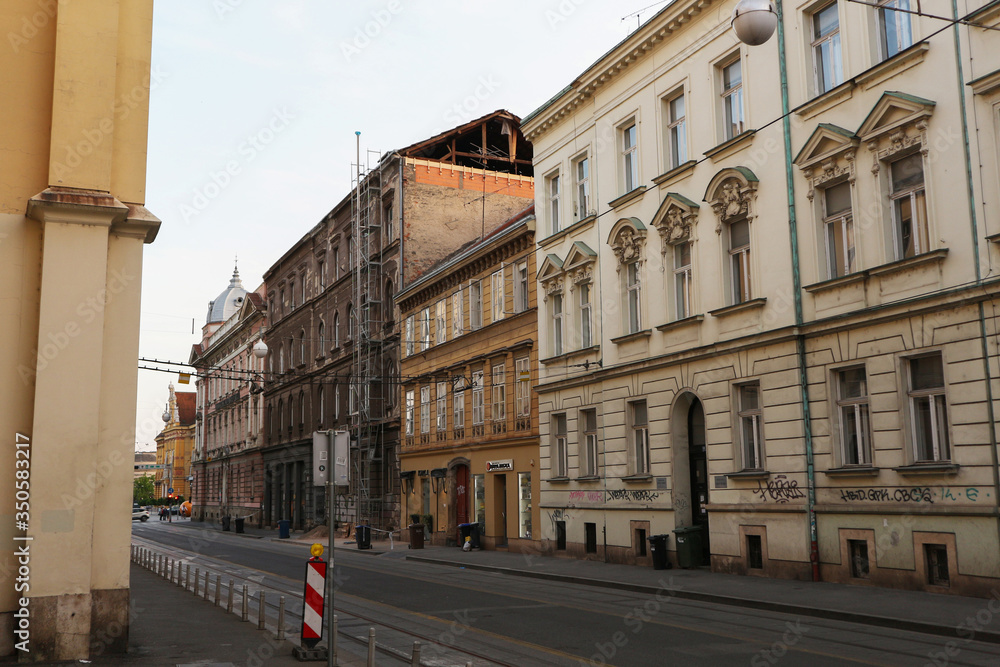 Zagreb/Croatia-May 1st,2020: Damaged buildings in the old city center after earthquake and during corona virus lock down, only workers removing debris are moving in the streets