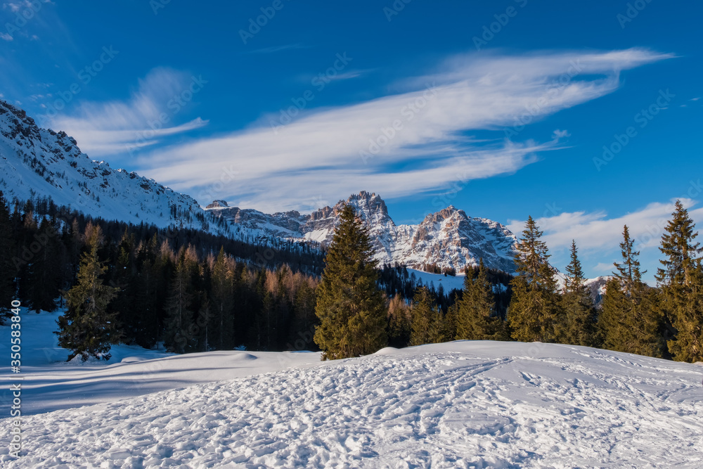 View from the Kreuzberg ski slope to the top of the Sextner Rotwand in the Dolomites. January 2020