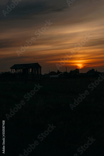 Fiery red sunset in the village   KOROVYAKOVA  SVERDLOVSKAYA OBLAST - 9 MAY 2020.