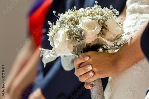 Hold tight the bouquet