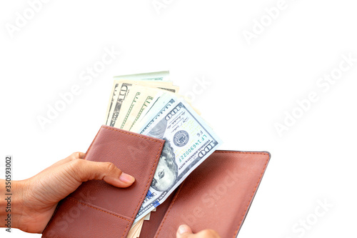 Fotografia US dollar banknotes in the purse on white background