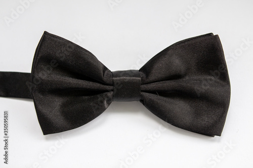 black bow tie on a white background