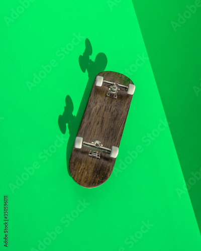skateboard fingerboard green yellow