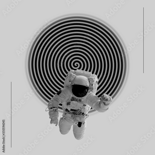 фотографія Astronaut against spiral