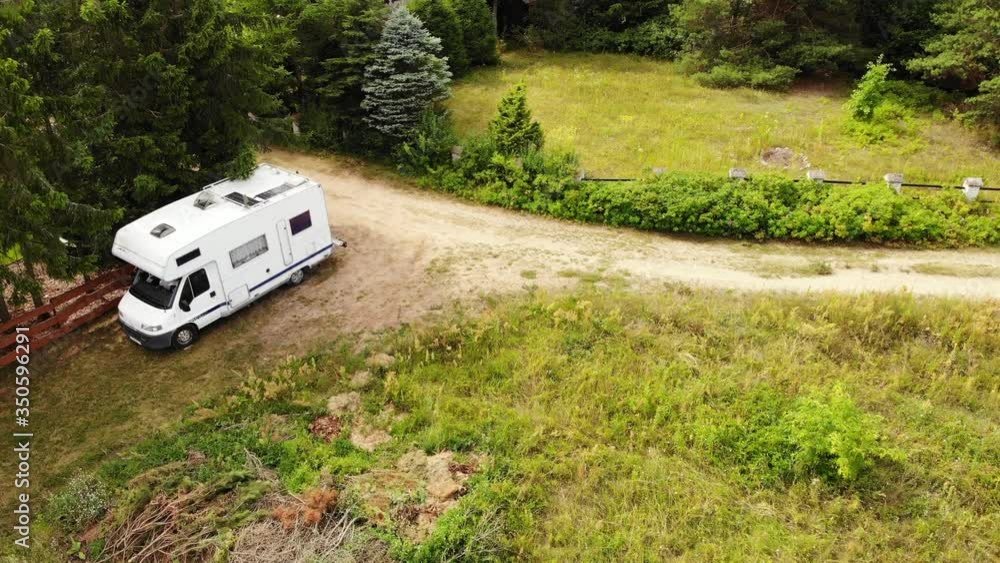 Camper car camping on nature. Vacation in motorhome Camper car camping on nature. Vacation in motorhome
