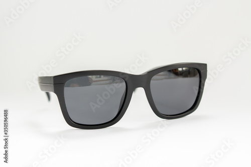 black men's sunglasses from a sun on a white