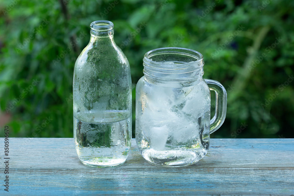 A glass of ice cube and Soda water A glass of ice cube and Soda water