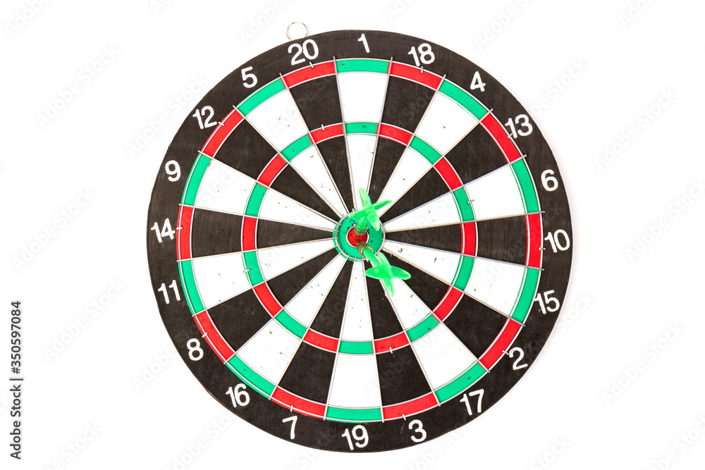 Dartboard with darts on white background, closeup. Purpose concept Dartboard with darts on white background, closeup. Purpose concept
