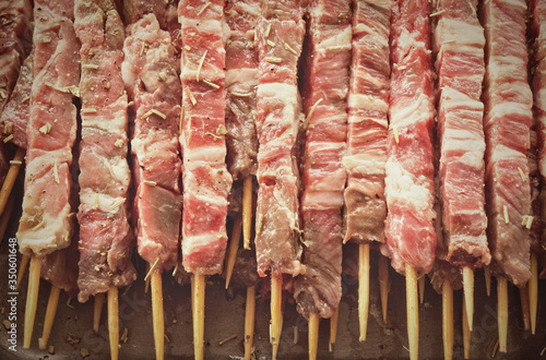 Traditional italian arrosticini - skewers of lamb background photo