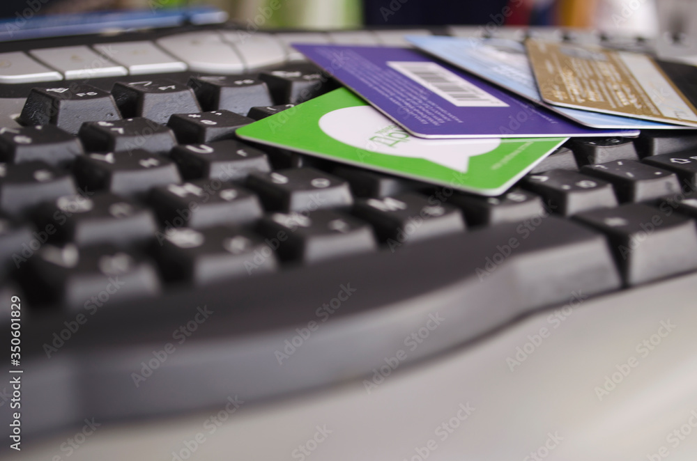 Credit card on the keyboard. Trade and business on the Internet. Earnings and finance.