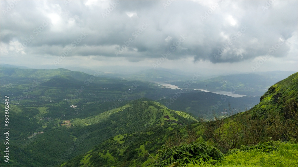 Naklejka premium Mountains landscape with sky 