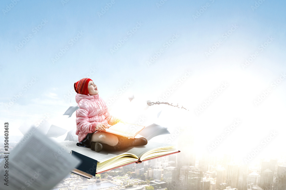 Little girl reading a book Little girl reading a book