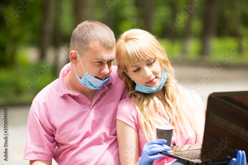
masked family in the park,
coronavirus, covid