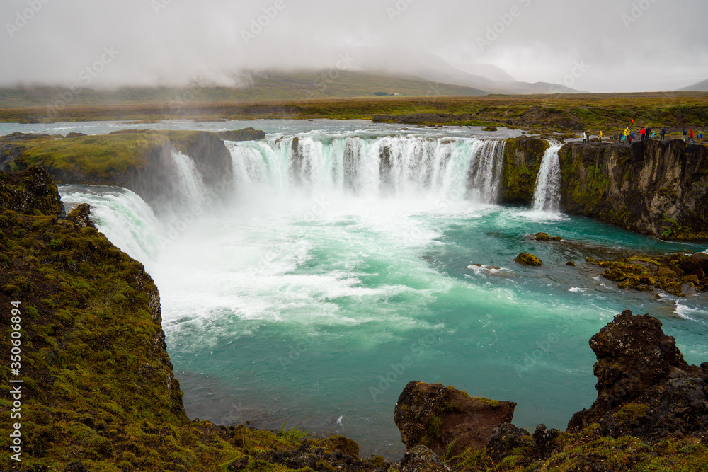 The Godafoss Icelandic: Goðafoss waterfall of the gods, is a famous waterfall in Iceland. The Godafoss Icelandic: Goðafoss waterfall of the gods, is a famous waterfall in Iceland.