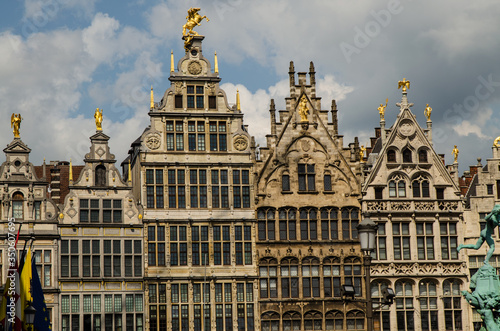 Antwerp, Flanders, Belgium. August 2019. On a beautiful sunny day detail of the facades of the guild houses in the town hall square. Elegant gilding embellishes the Renaissance architecture.